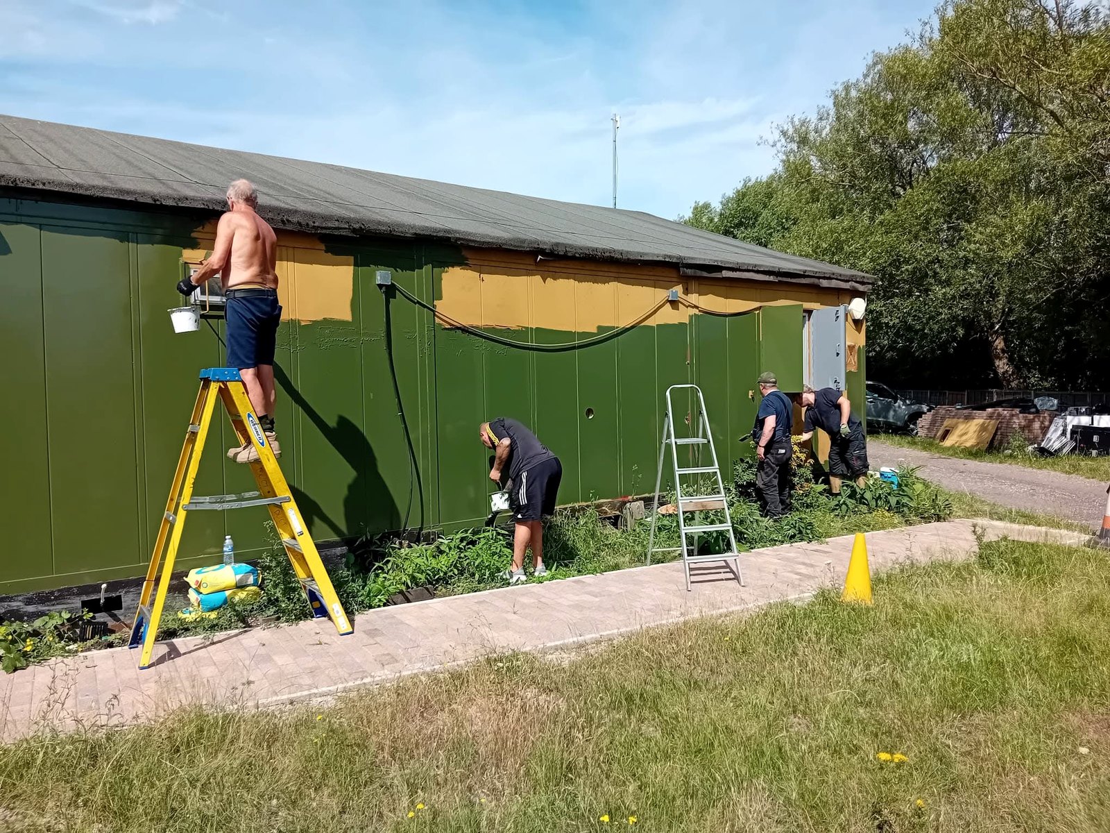 Members painting the clubhouse during the 2025 to 2026 refurbishment